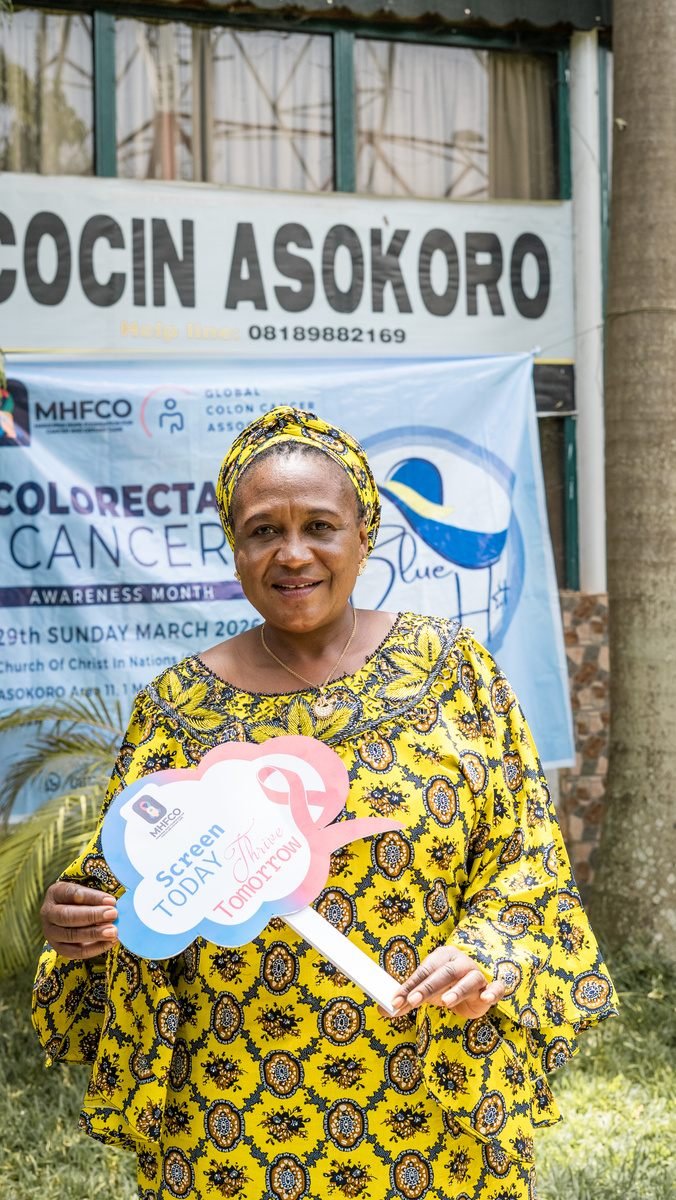 Participant holding an awareness sign