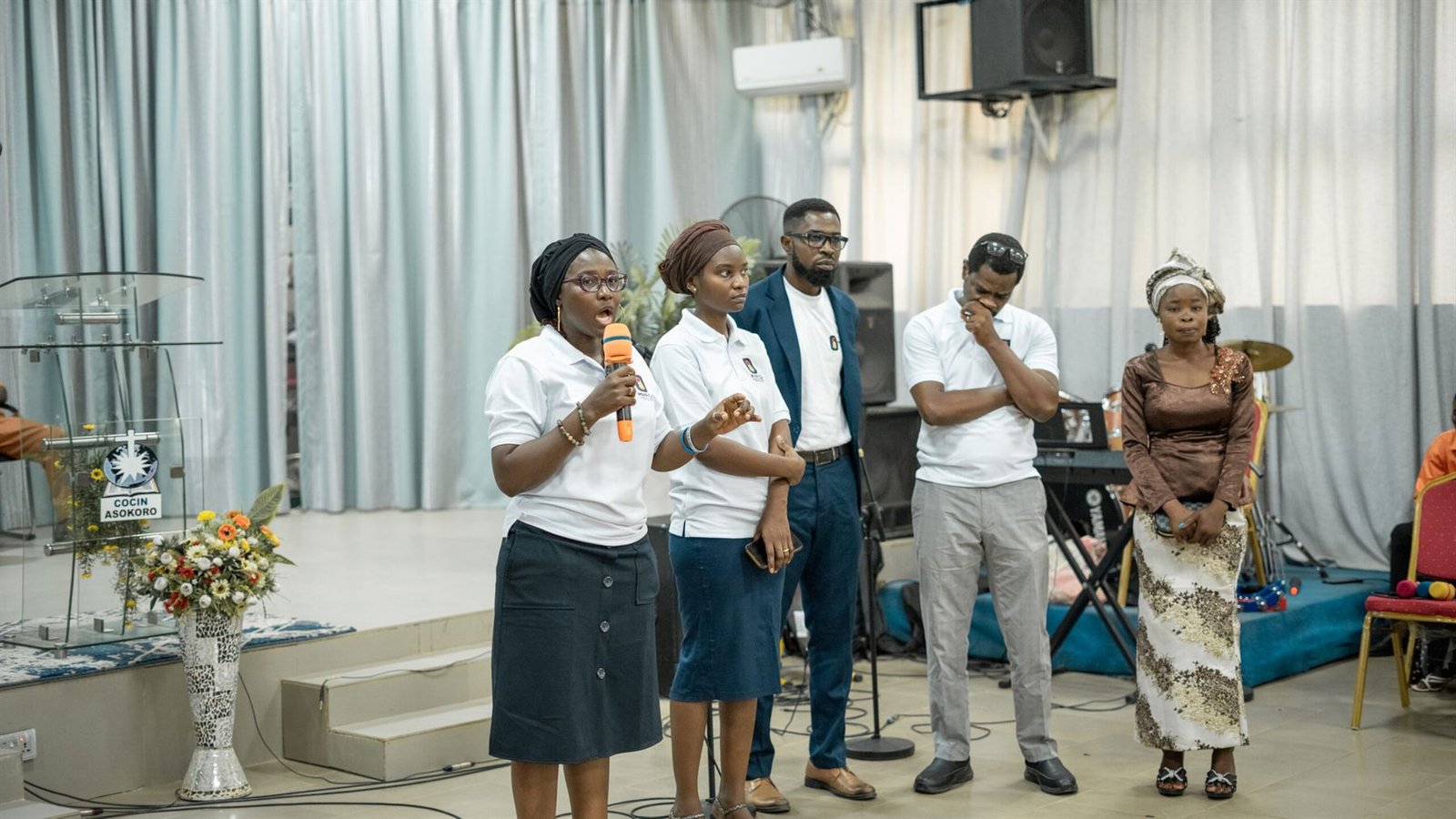 MHFCO team member addressing the congregation